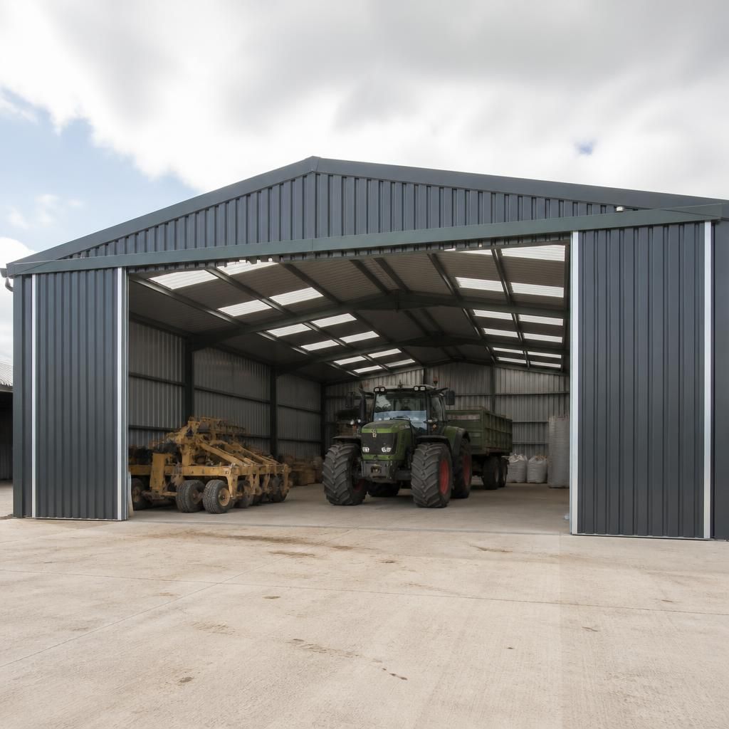 Hot-rolled steel framed shed with wide access doors and agricultural machinery inside